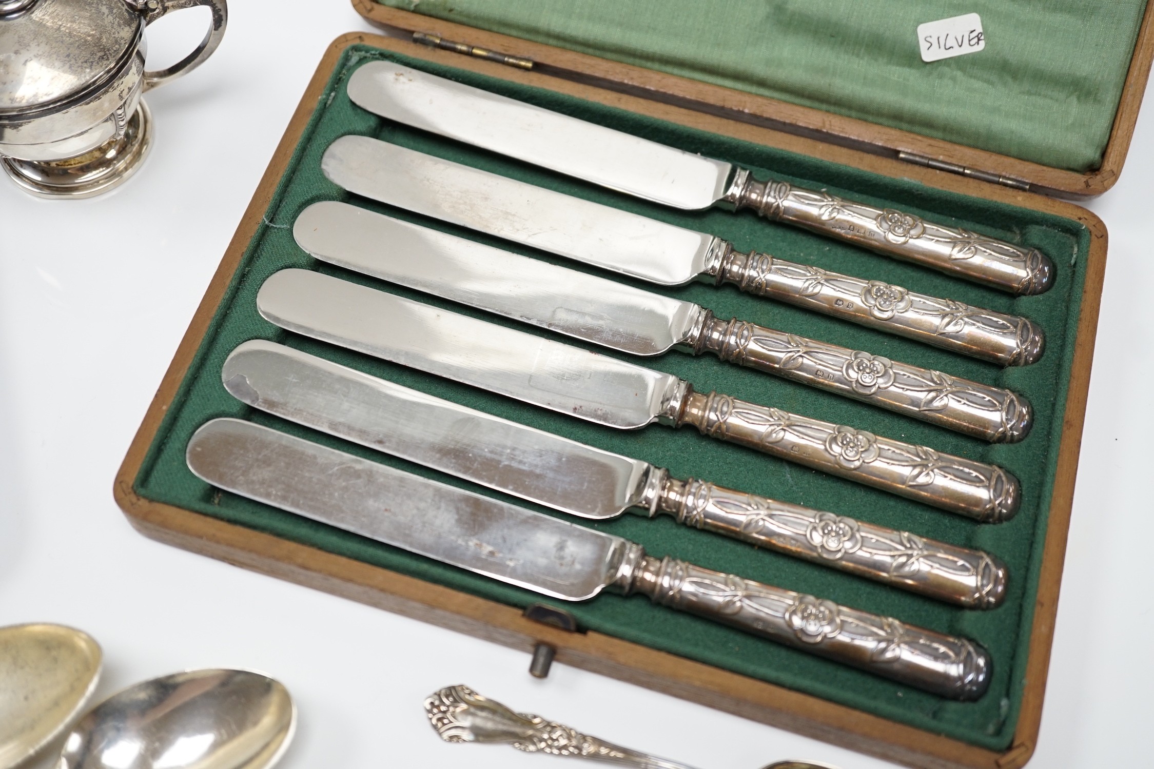 Sundry small silver, including flatware, pair of salts, a silver mustard pot and a silver fruit knife.